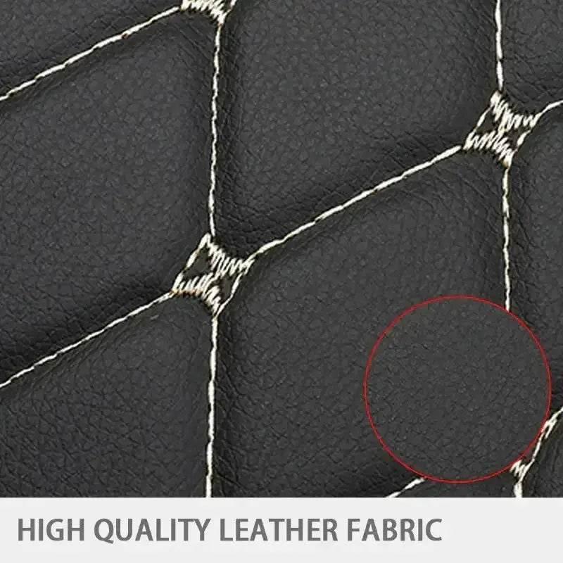 Black car seat protector pad installed on a car seat protecting it from dirt and wear.