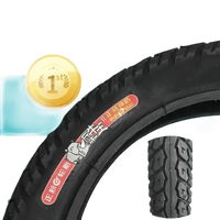 Black CST electric bike tire seen from a different angle showing tread texture.