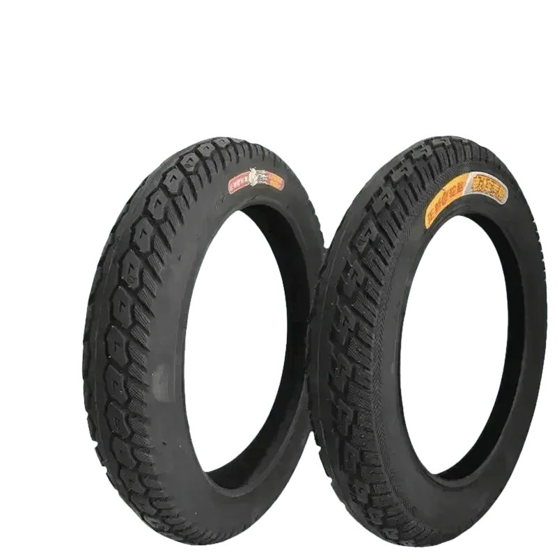 Two black CST electric bike fat tires standing upright on a white background.