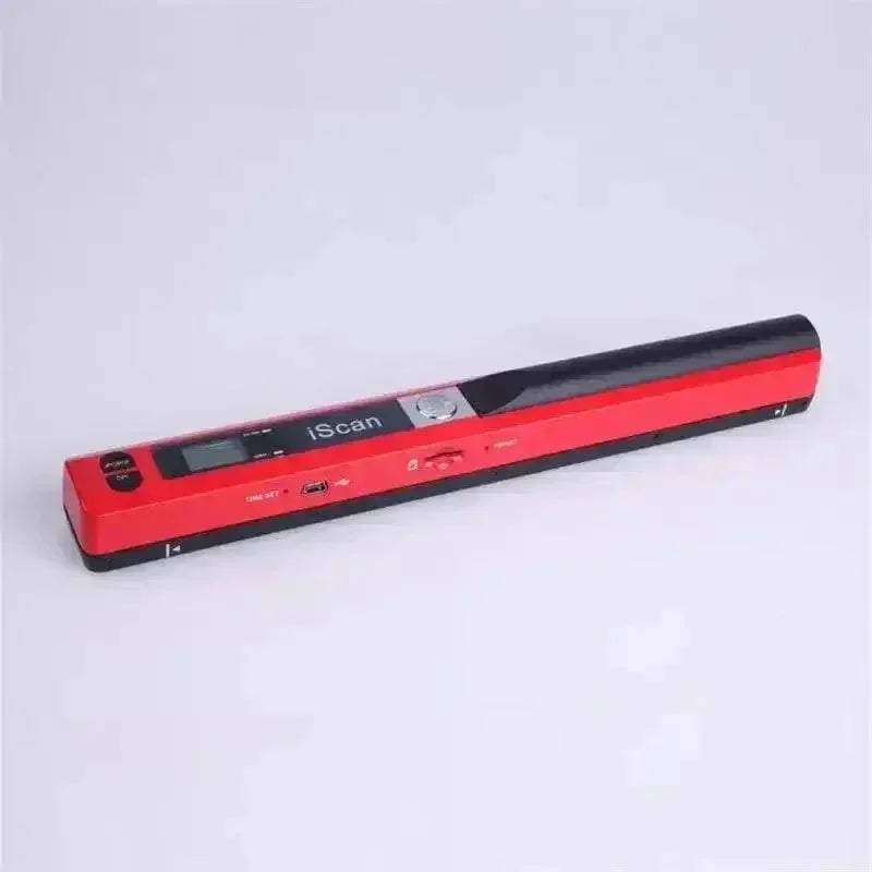 Black handheld scanner placed on an open notebook with documents and a pen nearby