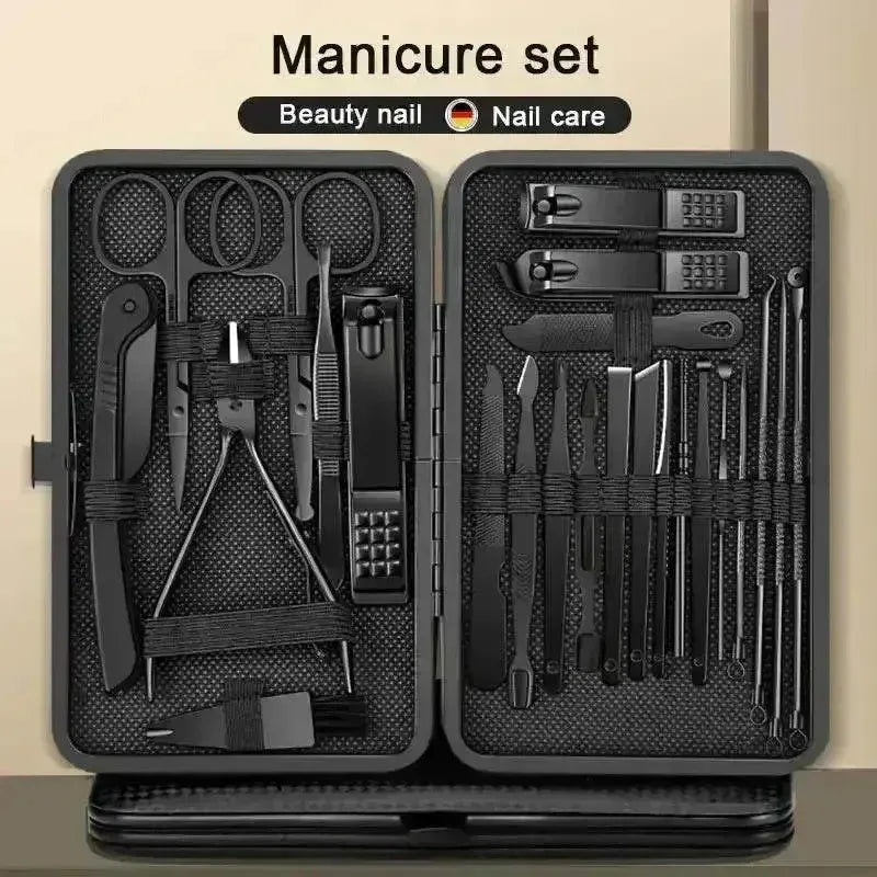 Black manicure nail clipper set with multiple grooming tools neatly arranged in a black case.