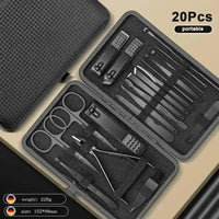 Pink manicure nail clipper case open showing black and metallic grooming tools inside.