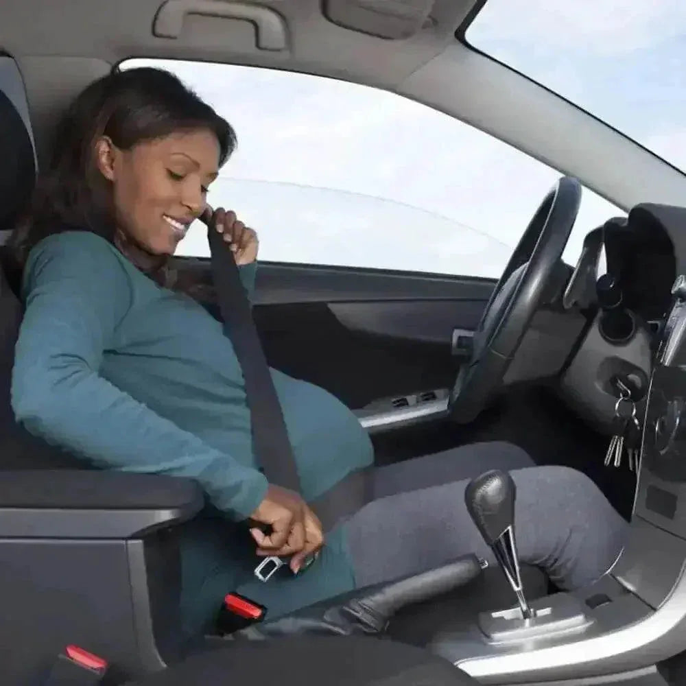 Side view of the seat belt extender buckled into a car seat belt receptacle.