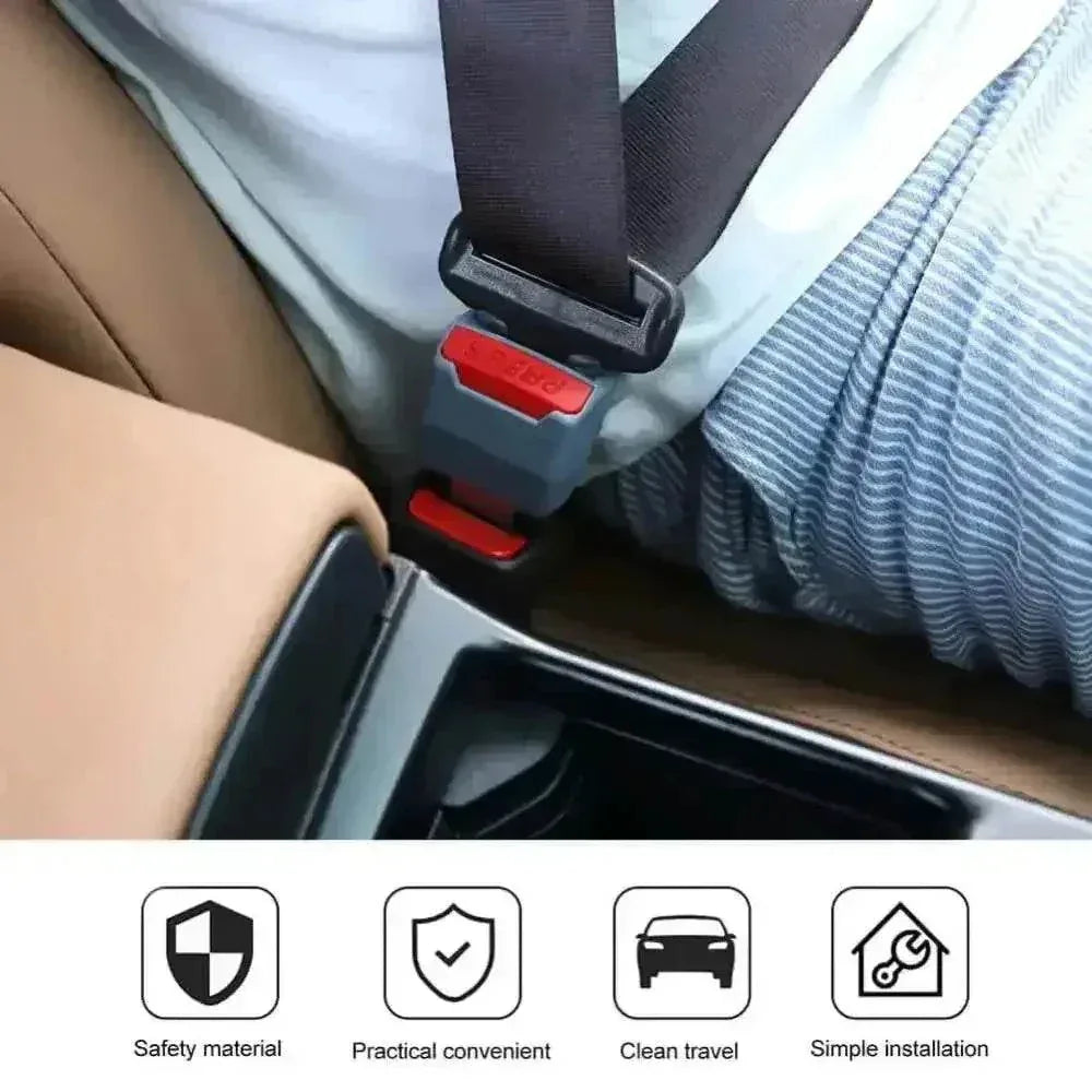 Close-up of seat belt extender’s red latch with safety lock mechanism.