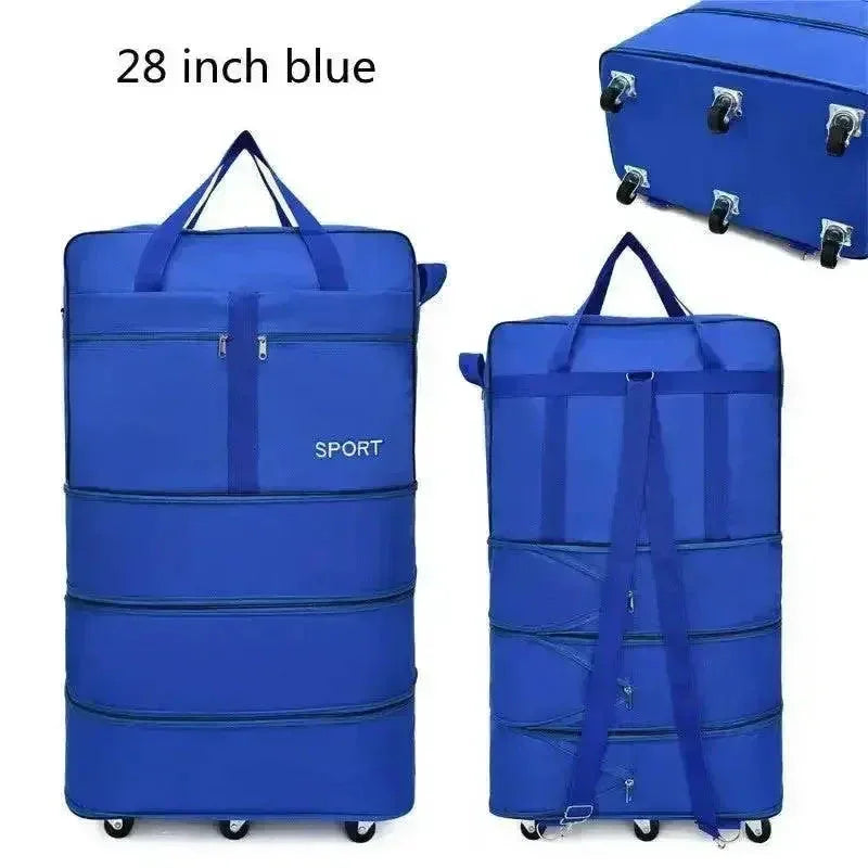 Blue version of rolling foldable luggage bag standing upright with handle extended.