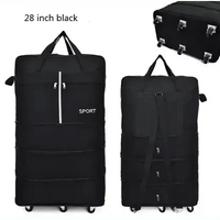 Top-down view of black foldable luggage bag displaying spacious main compartment and zipper.