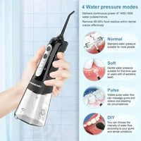 Side view of black portable dental flosser showing water reservoir and nozzle.