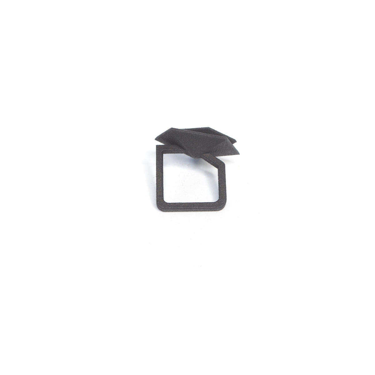 Top view of black Geometric Cocktail Ring highlighting bold angular design.