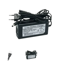 Green battery charger unit designed for lithium-ion scooter batteries.