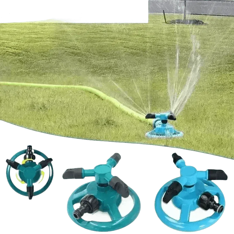 Side view of blue automatic rotating sprinkler watering healthy green lawn.