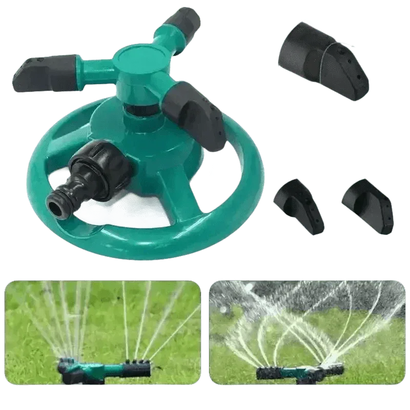 Green garden sprinkler spraying water over grass in outdoor setting.