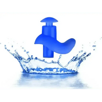 Top view of blue silicone water sports earplugs emphasizing their ergonomic design.