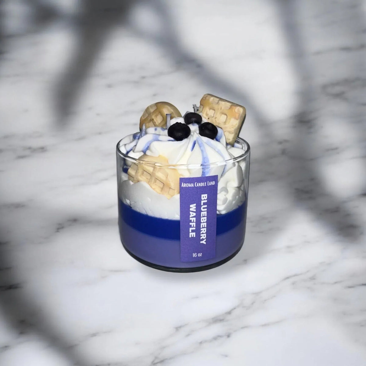 Blueberry Waffle scented candle packaged as a gift with fresh blueberries decor.