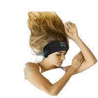 Side view of blue Bluetooth sleeping headphone headband with soft padding.