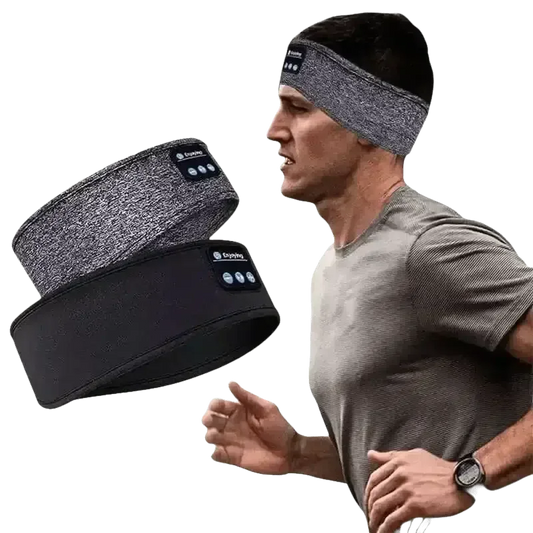 Blue Bluetooth sleeping headphones headband laid flat, showing soft fabric and controls.