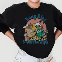 Close-up of black sweatshirt showing detailed 'Bong Rips & Cotton Sips' graphic