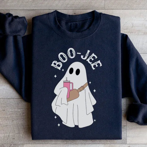 Close-up of black Boo Jee sweatshirt featuring peachy Sunday t-shirt graphic design.