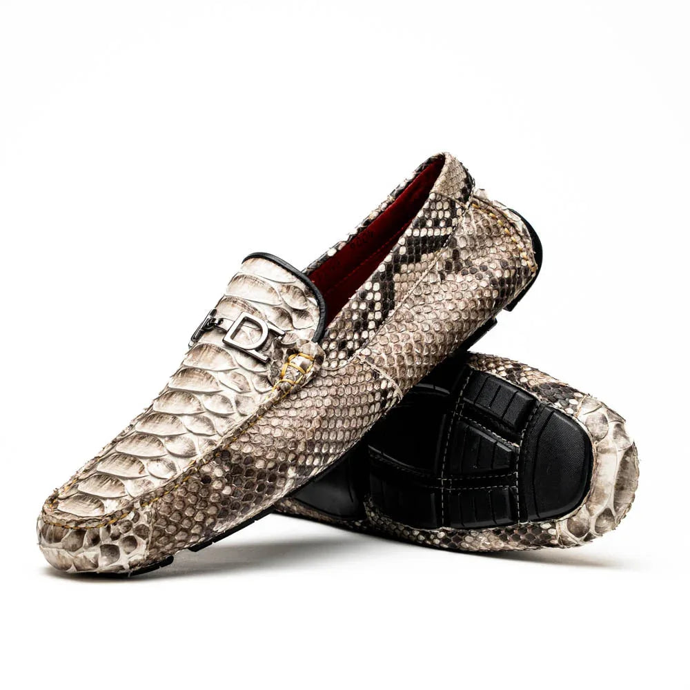 Close-up of natural-toned python skin driving shoe showcasing textured exotic scales and sleek loafer design.