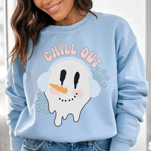 Light blue fleece sweatshirt with 'Chill Out' print displayed on plain background