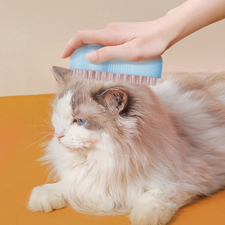 Electric brush with massage needle tips designed for gentle pet grooming.