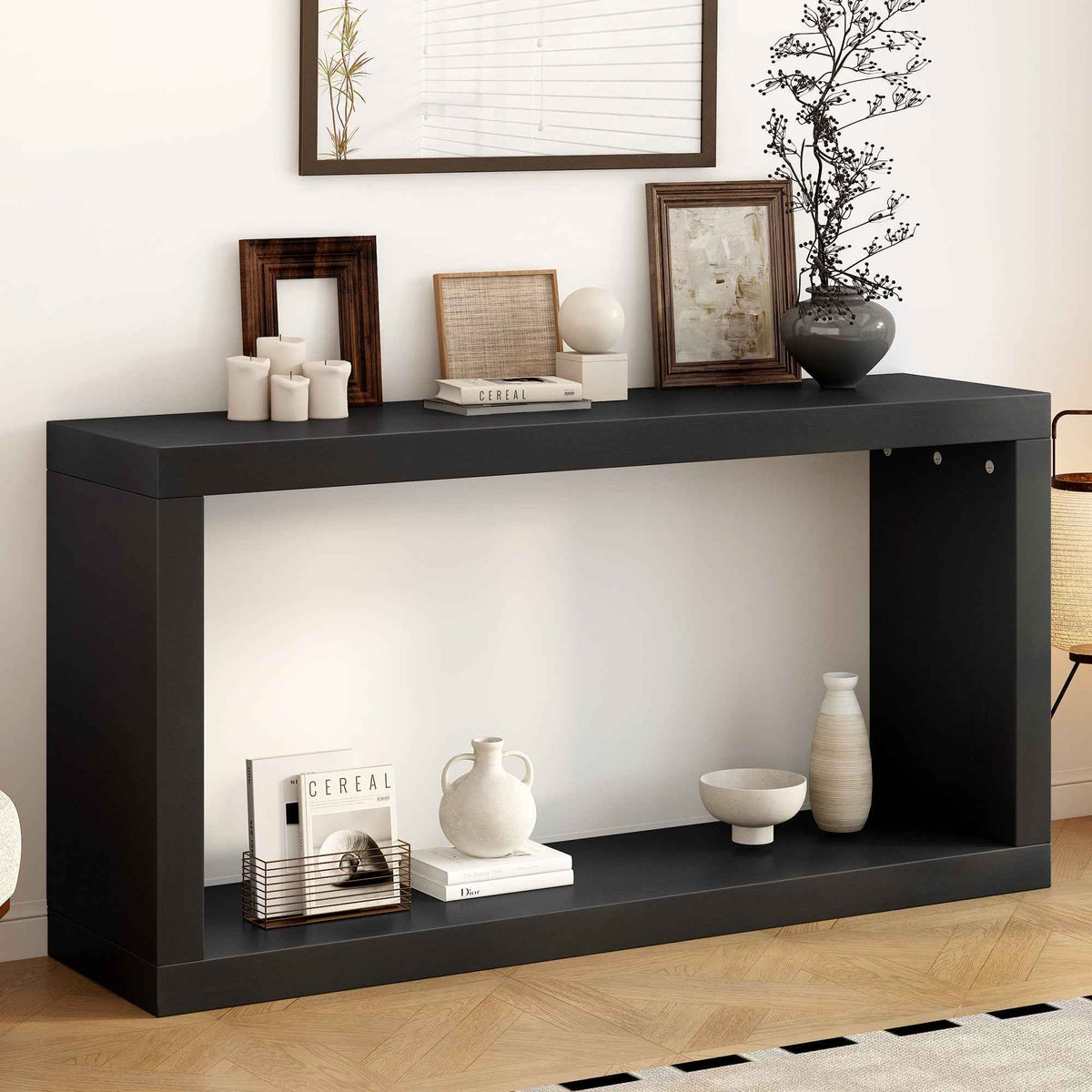 Black square modern minimalist entrance table with clean lines in a stylish room setting