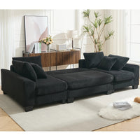 Large black U-shaped corduroy sleeper sofa with square arms and pull-out bed, seating four people.