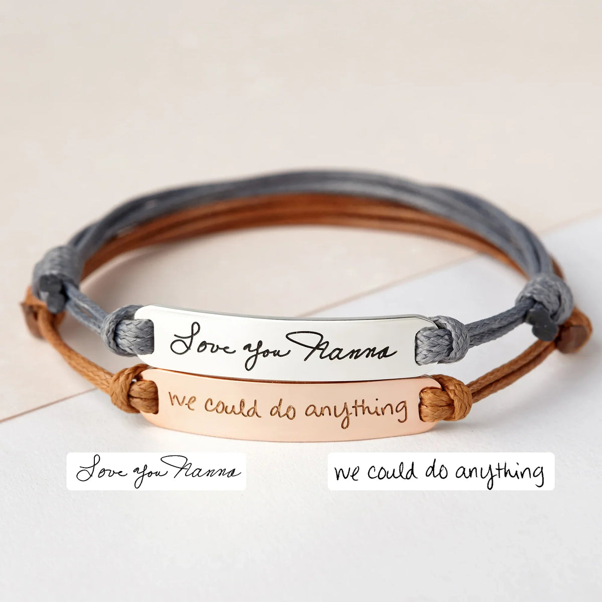Silver bracelet with engraved personal handwritten message in cursive font.
