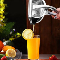 Top view of JuicyStar manual juice squeezer highlighting circular juice collection area.