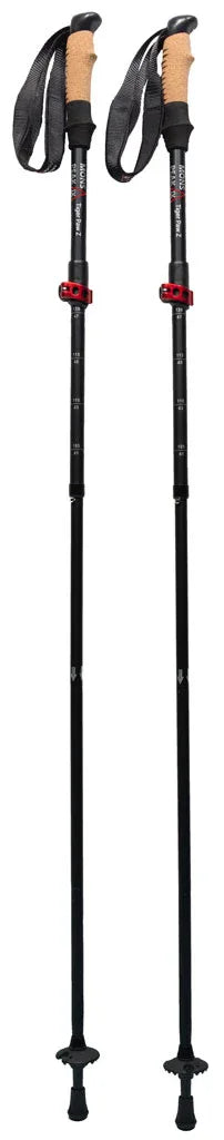 Snap-click compression lock mechanism on hiking trekking pole for easy height adjustment.