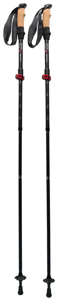 Snap-click compression lock mechanism on hiking trekking pole for easy height adjustment.