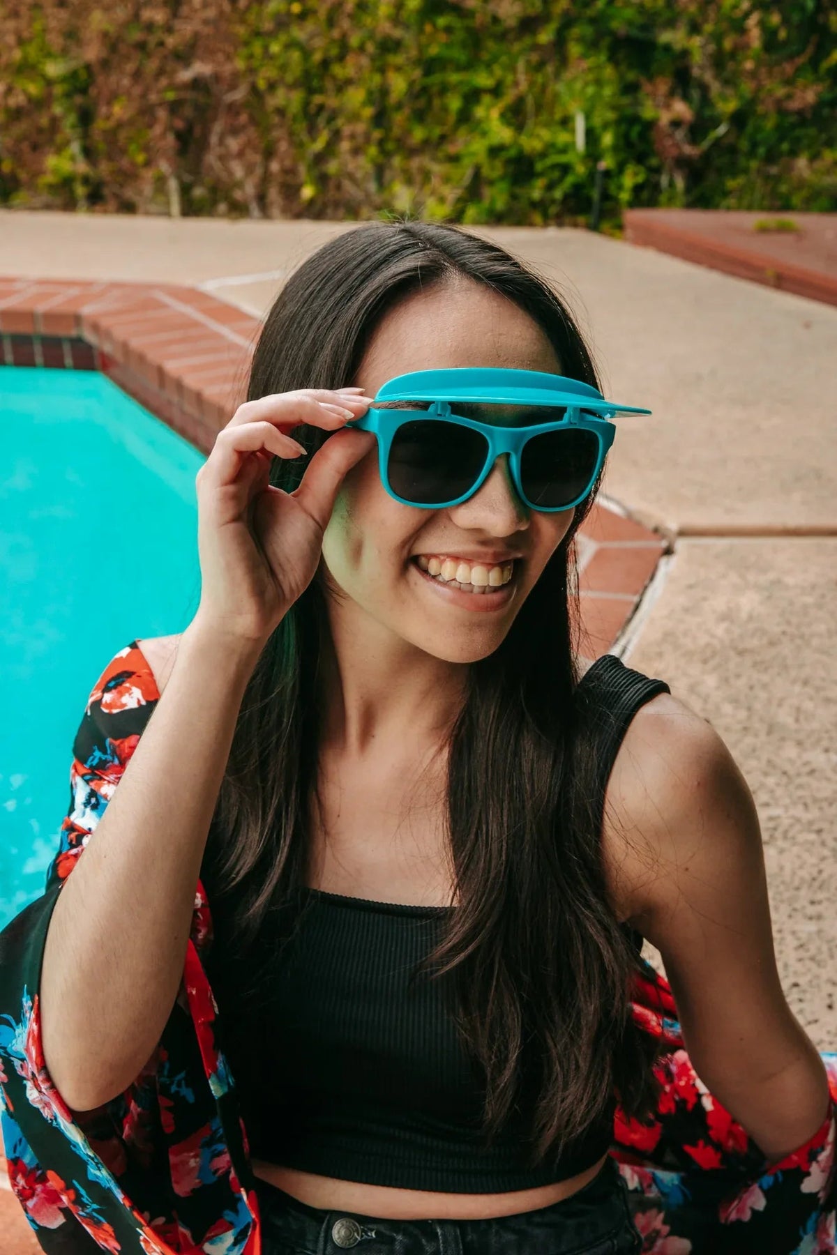 Flipside Sunglasses displayed with visor flipped down over lenses for added protection.