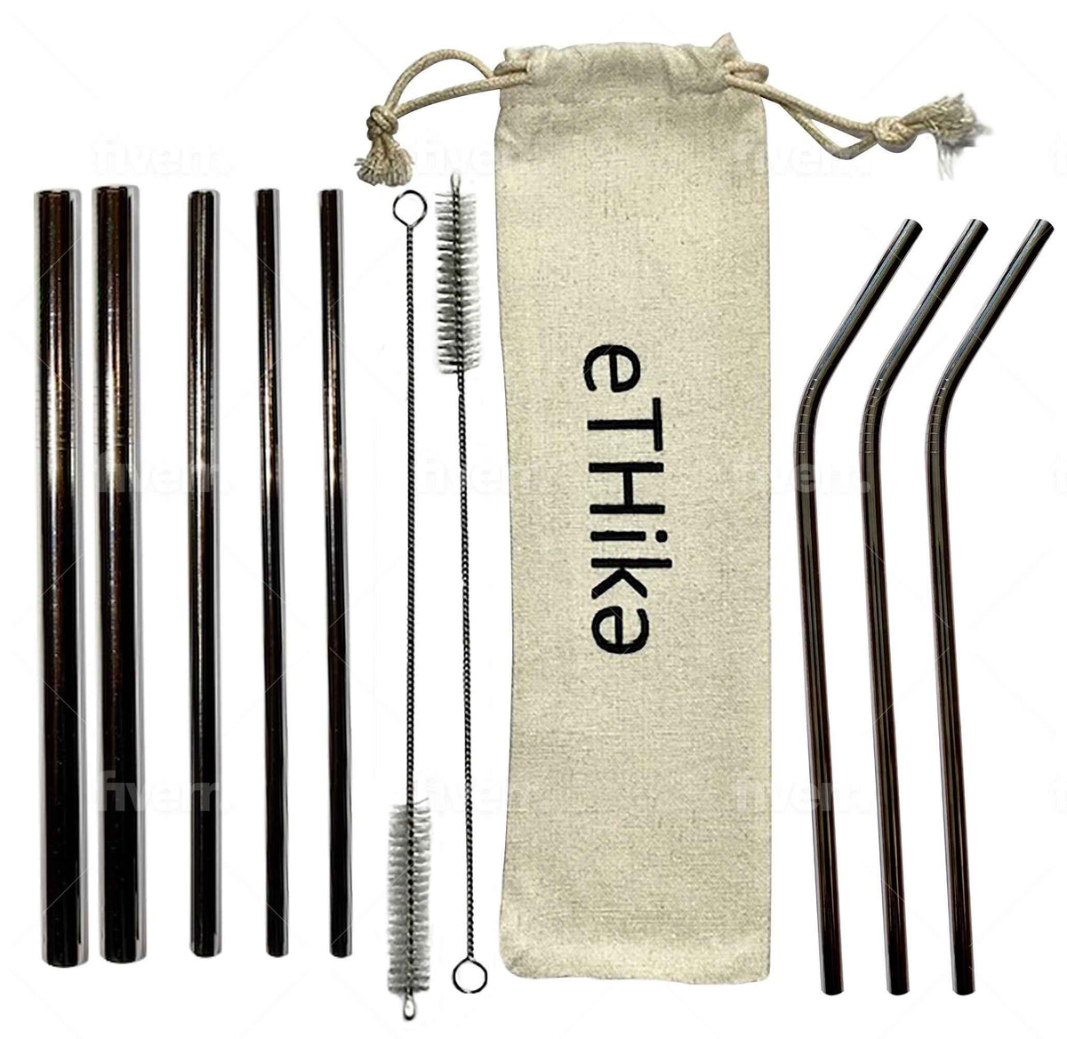 Stainless steel straws placed in a circular arrangement with a cleaning brush and cotton pouch on a flat surface.