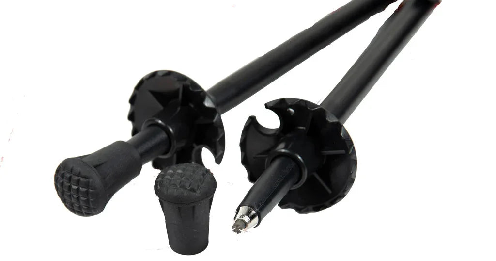 Top compact palm grip atop hiking pole highlighting ergonomic design materials.