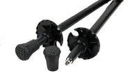 Top compact palm grip atop hiking pole highlighting ergonomic design materials.