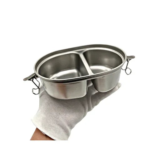 Stainless steel snack box with two compartments, suitable for separating snacks or small meals.