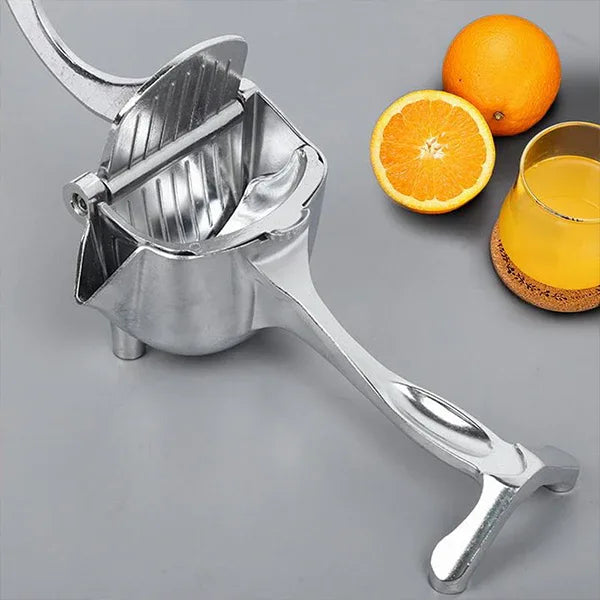 JuicyStar juice squeezer angled side view showcasing sturdy stainless steel design and size.