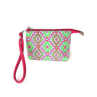 Open red wristlet bag displaying interior compartment with satin lining and organized contents.