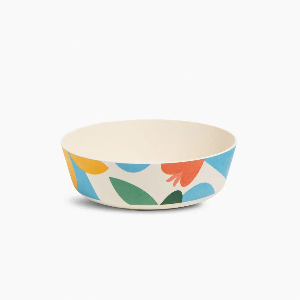 Stack of four colorful bamboo bowls with nature-inspired prints, displayed on a wooden surface.