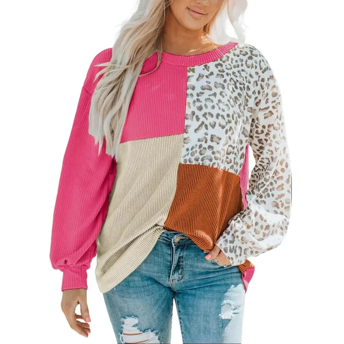 Close-up of ribbed texture and leopard print patchwork design on the women's long sleeve top.
