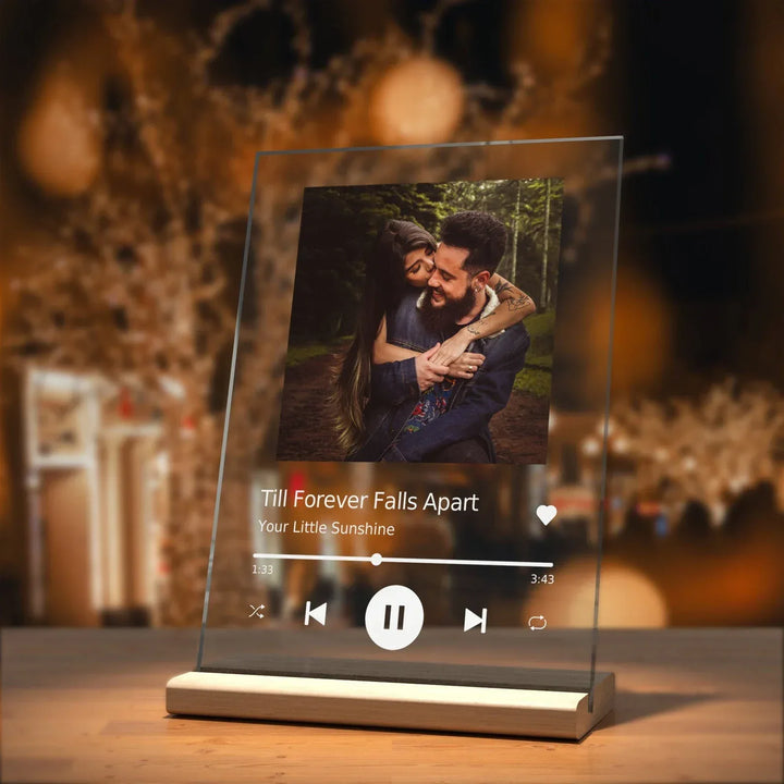 Personalized glass music plaque featuring a custom song and photo with a modern acrylic design.