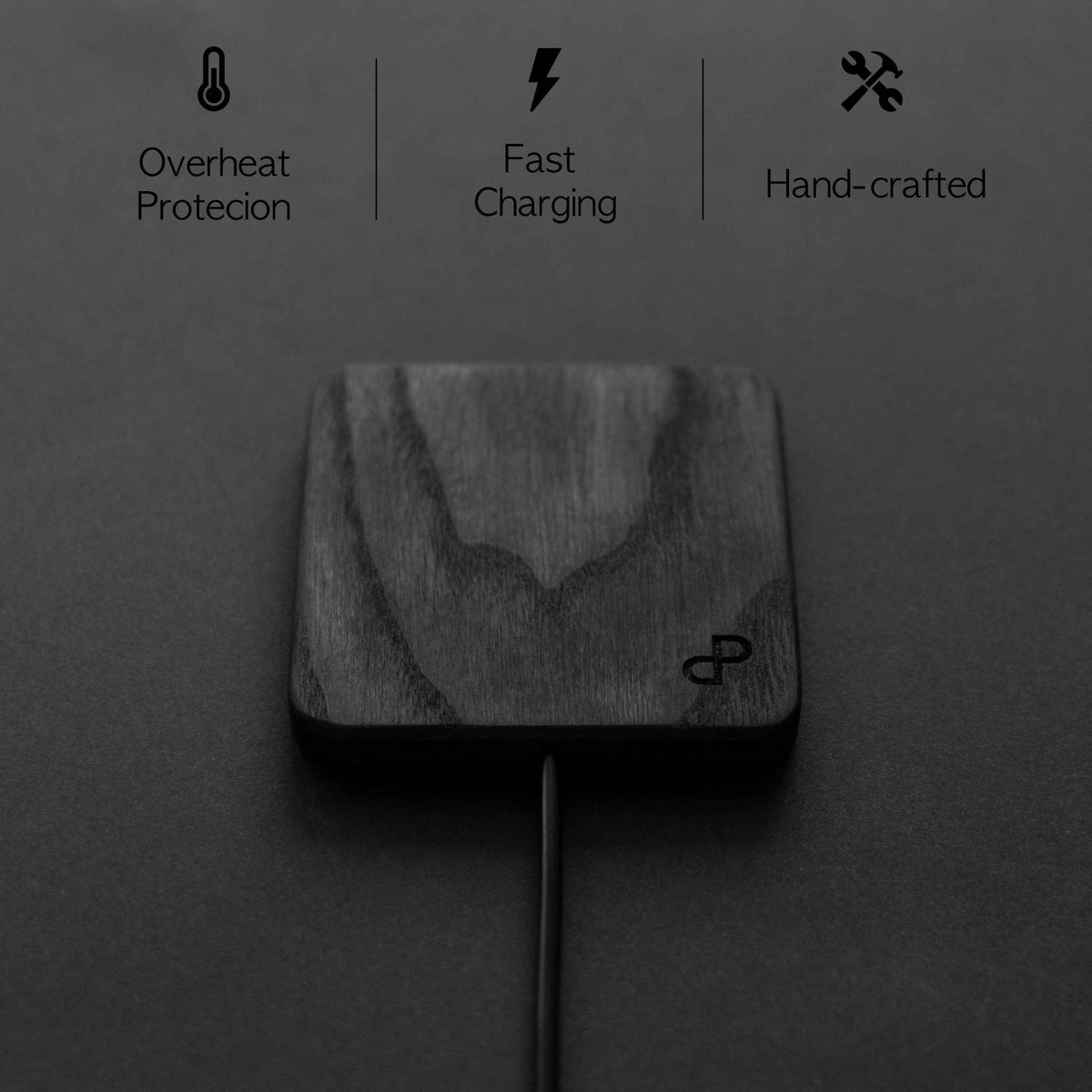 Side view of handcrafted wooden wireless charger showing its slim profile and smooth edges