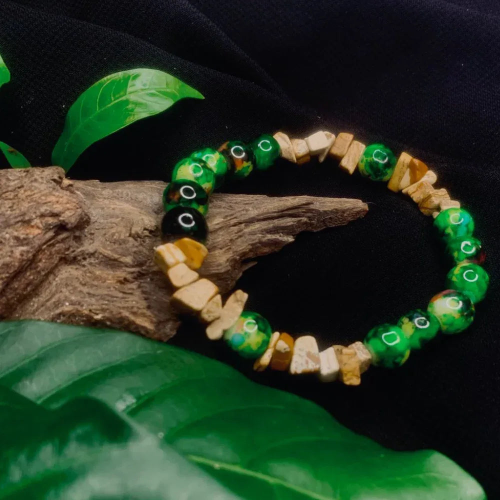 Side angle showing alternating rough and smooth stone chips on a stretch bracelet.