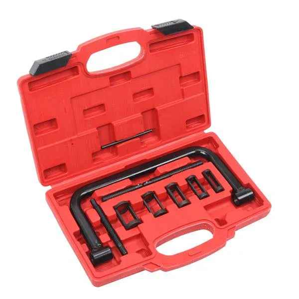 A set of ten metal valve spring compressor tools in various sizes displayed neatly in a plastic case.