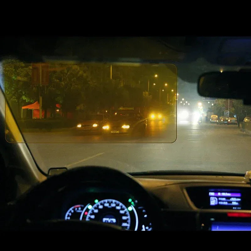 A car visor attachment filtering sunlight and headlight glare, improving driver visibility and comfort.