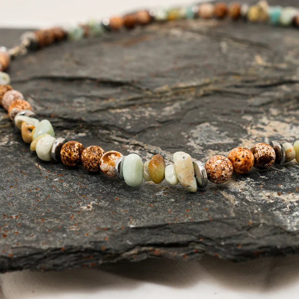 Natural agate stone necklace showcasing unique bead patterns and subtle color variations.
