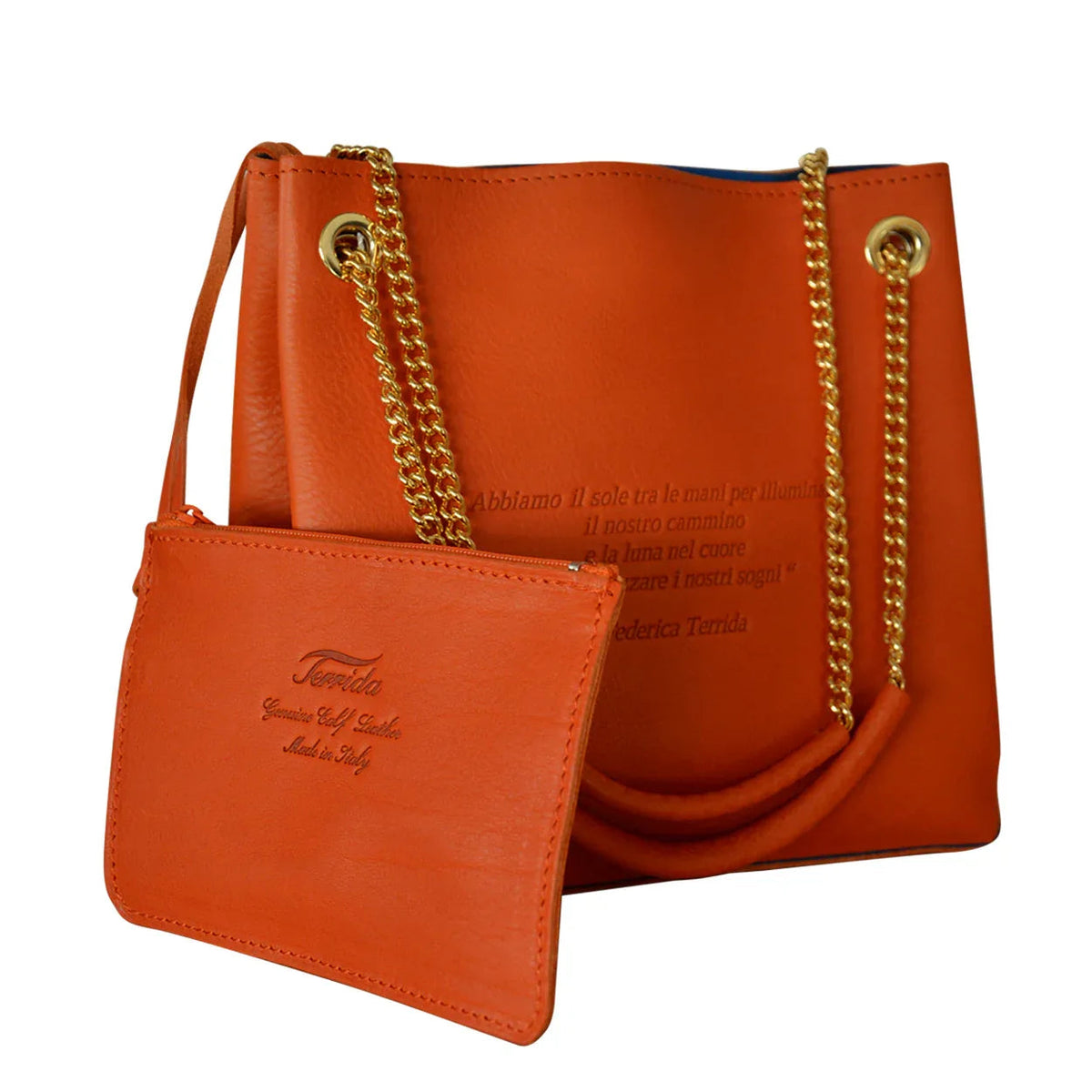 Interior view of Loving Handbag showing removable inner bag usable as a wallet, with organized compartments.