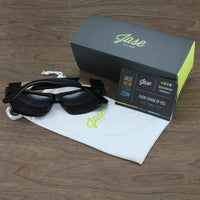 Black Jase New York Carter sunglasses on white background showing square frame and metal pyramid accents.