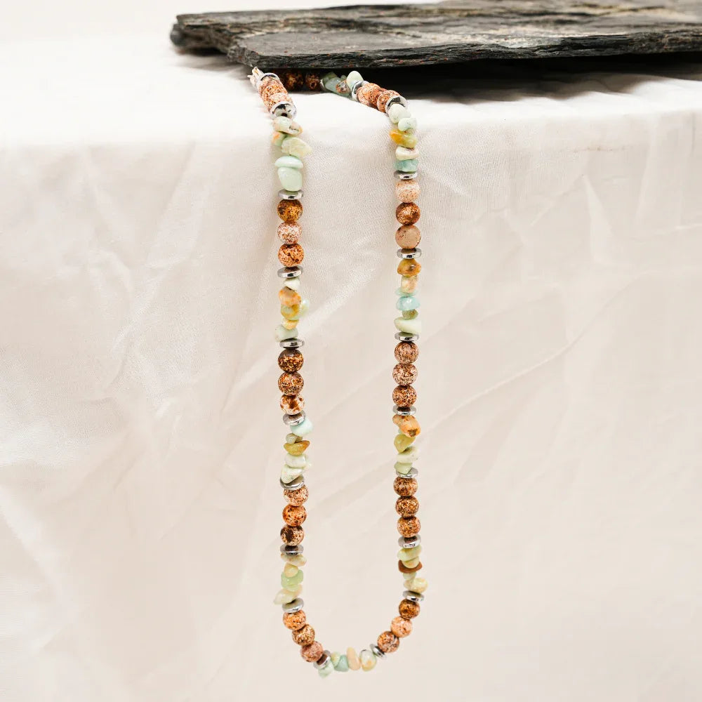 Detailed view of multicolored agate chip beads strung together in a handcrafted necklace.