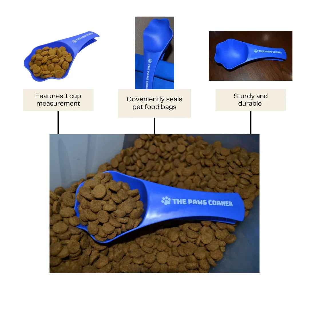Paw-shaped pet food scoop with a built-in clip, curved edges, and flexible design for easy scooping.