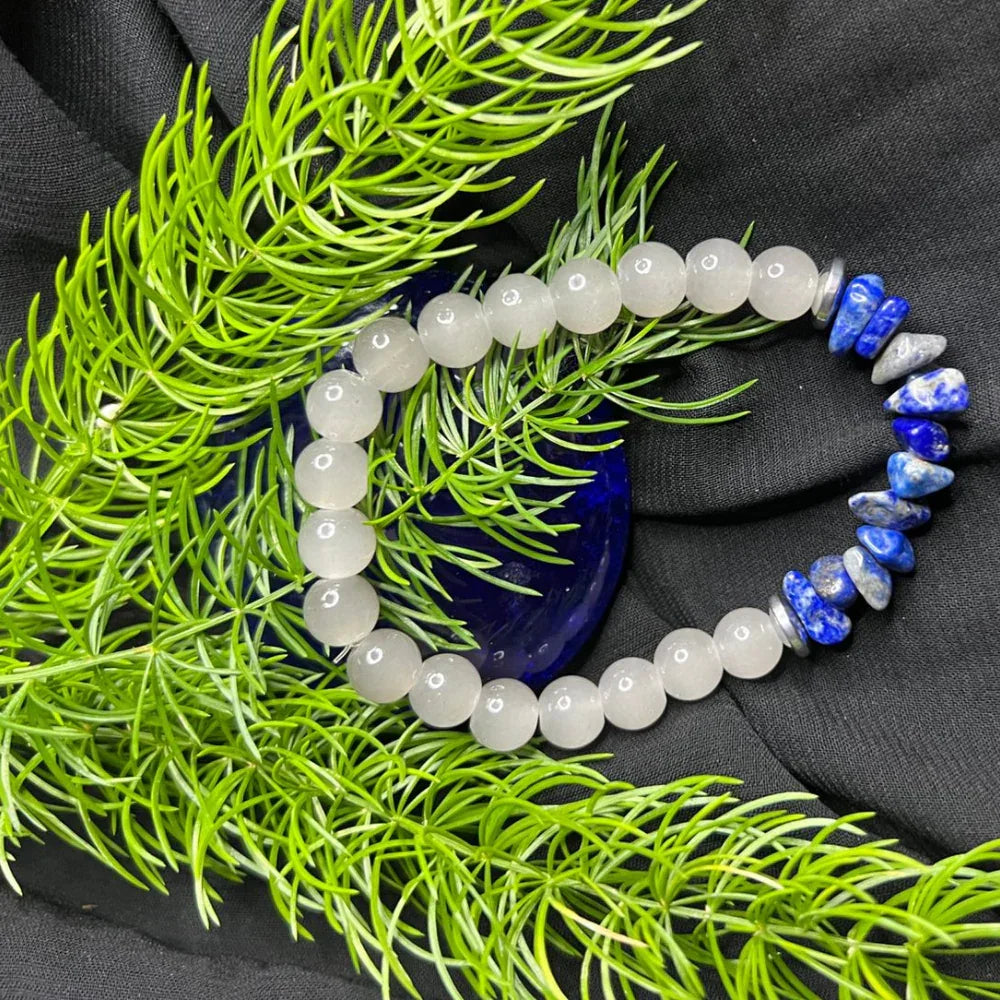 Blue and white stone bead bracelet displayed flat, showing color contrast and natural texture.